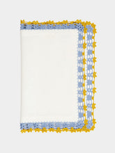 House of Capricorn Hand-Embroidered Leonor White Linen With Blue and Yellow Crochet Placemat