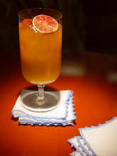 House of Capricorn Hand-Embroidered Teresa White Linen with Light Blue Crochet Cocktail Napkin