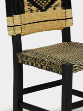 House of Capricorn Handmade Coruche Black Wood and Reed Dining Chair