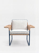 House of Capricorn Carvalhal Blue Metal and Handmade Wicker Easy Chair