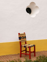 House of Capricorn Handmade Coruche Red Wood and Multicoloured Reed Dining Chair