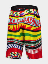 Dolce & Gabbana Silk Twill Shorts With Carretto Print