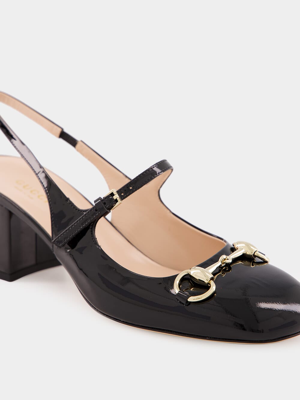 Black Horsebit Patent Pumps