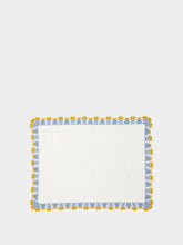 House of Capricorn Hand-Embroidered Leonor White Linen With Blue and Yellow Crochet Placemat
