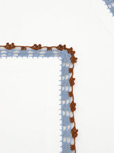 House of Capricorn Hand-Embroidered Leonor Ecru Linen with Blue and Brown Crochet Napkin