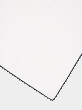 House of Capricorn Hand-Embroidered Teresa White Linen with Black Crochet Napkin