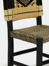 House of Capricorn Handmade Coruche Black Wood and Reed Dining Chair