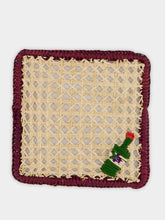 Coro Cora Natural and Burgundy Iraca Palm Wine Coaster
