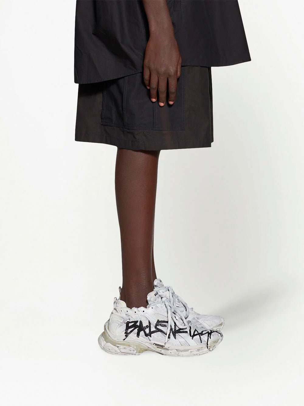 BalenciagaRunner graffiti sneakers at Fashion Clinic